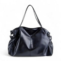Sac à main hobo en cuir végan noir, vue de face, double anse d'épaule et bandoulière réglable