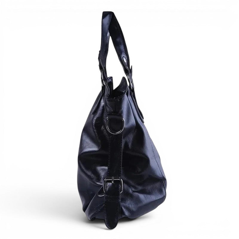 Profil du hobo bleu marine, soufflet arrondi, anneau en D et sangle latérale réglable à boucle