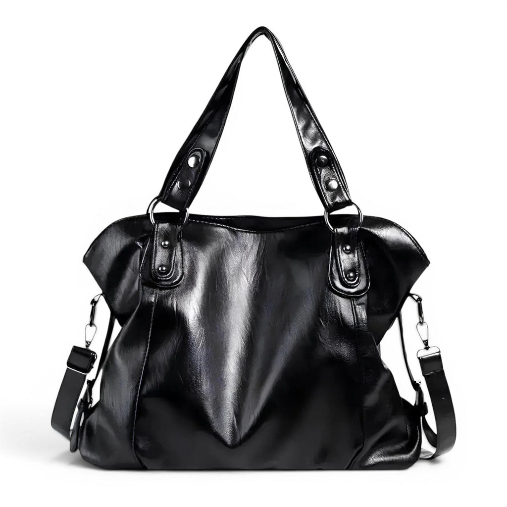 Sac hobo noir en cuir végan lustré, de face, anses rivetées et bandoulière amovible à mousquetons