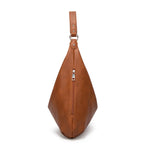 Profil étroit du sac caramel, glissière verticale sur le côté et sangle dressée au-dessus
