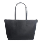 Tote noir en cuir végan grainé, fermeture à glissière et longues anses fines, vu de face