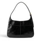 Besace d'épaule en cuir végan lustré noir, anse simple et boucle dorée réglable sur le côté