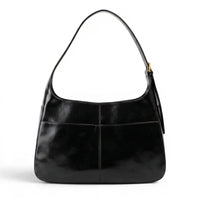 Besace d'épaule en cuir végan lustré noir, anse simple et boucle dorée réglable sur le côté