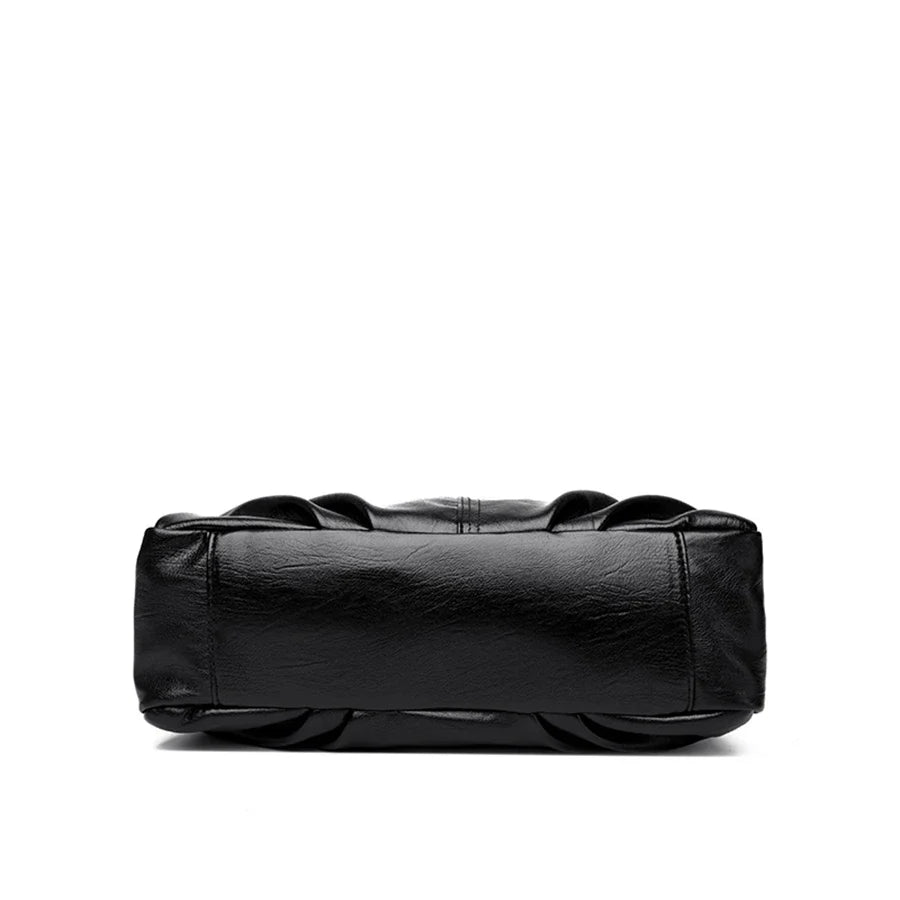 Fond du sac noir posé à plat, base rectangulaire et coutures d'assemblage sur le pourtour