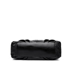Fond du sac noir posé à plat, base rectangulaire et coutures d'assemblage sur le pourtour