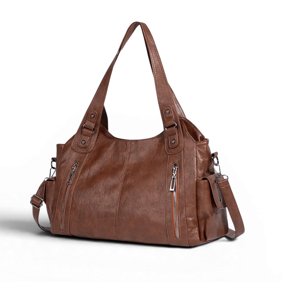 Marron cognac présenté de trois quarts, bandoulière détachée le long du flanc du sac