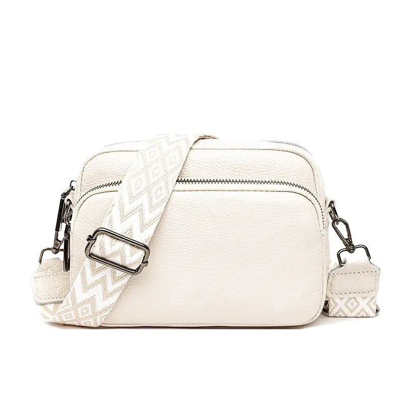 Écru crème pour ce sac appareil photo, double compartiment zippé et sangle graphique amovible