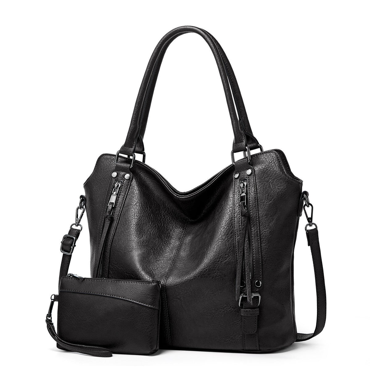 Duo noir : le cabas souple et sa pochette assortie à dragonne, posés côte à côte sur fond blanc