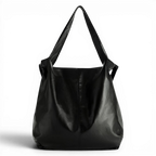 Grand cabas hobo en cuir végan noir brillant, détouré sur fond sombre, anses larges et souples