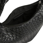 Doublure textile noire à l'intérieur du hobo ouvert, poche plaquée et glissière métallique visibles
