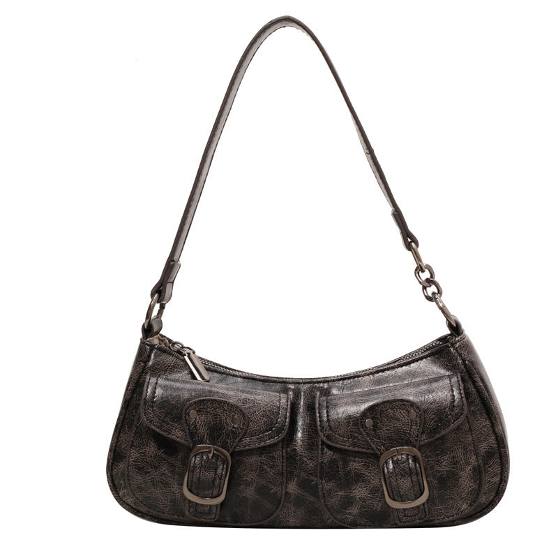 Noir délavé et légèrement grainé, le sac baguette seul, anse d'épaule fine à maillon métal